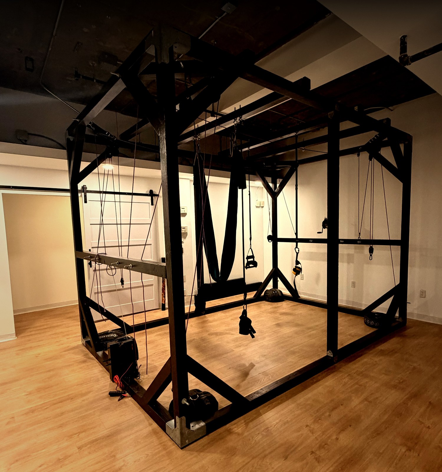 The Motion Frame, a four-point suspension traction system, in the Motion Room at Motion Code Studio in Burbank